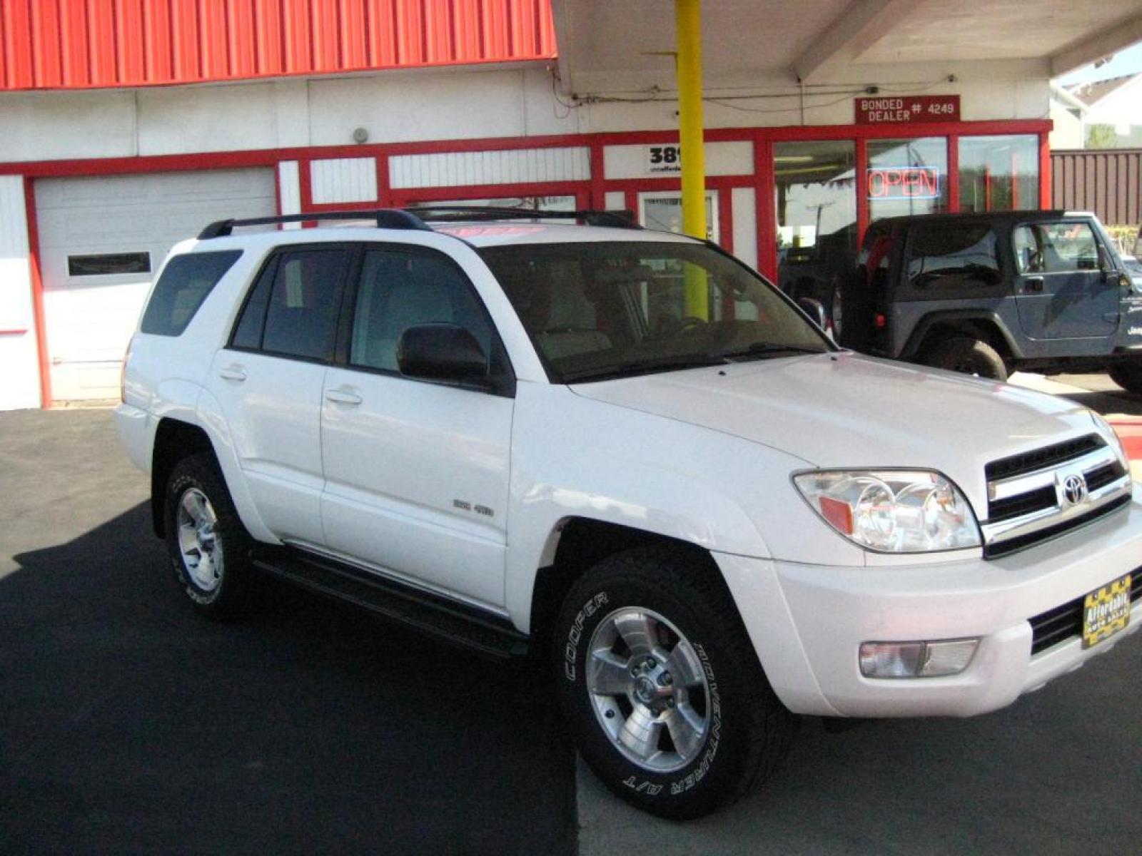 2005 White /tan Toyota 4Runner Sport Edition V6 4WD (JTEBU14R258) with an 4.0L V6 DOHC 24V engine, 5-Speed Automatic Overdrive transmission, located at 242 N Hwy 89, North Salt Lake, UT, 84054, (801) 510-2128, 40.904400, -111.891518 - SOLD!!! To check out similar vehicles and our entire inventory go to www.utahaffordable.com - Photo #4