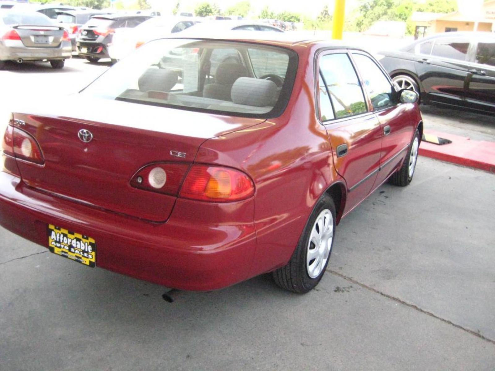2001 Maroon /tan Toyota Corolla CE (1NXBR12E81Z) with an 1.8L L4 DOHC 16V engine, auto transmission, located at 3819 South Hwy 89, Bountiful, UT, 84010, (801) 298-3777, 40.876678, -111.870071 - SOLD To check out similar vehicles and our entire inventory go to www.utahaffordable.com. - Photo #3