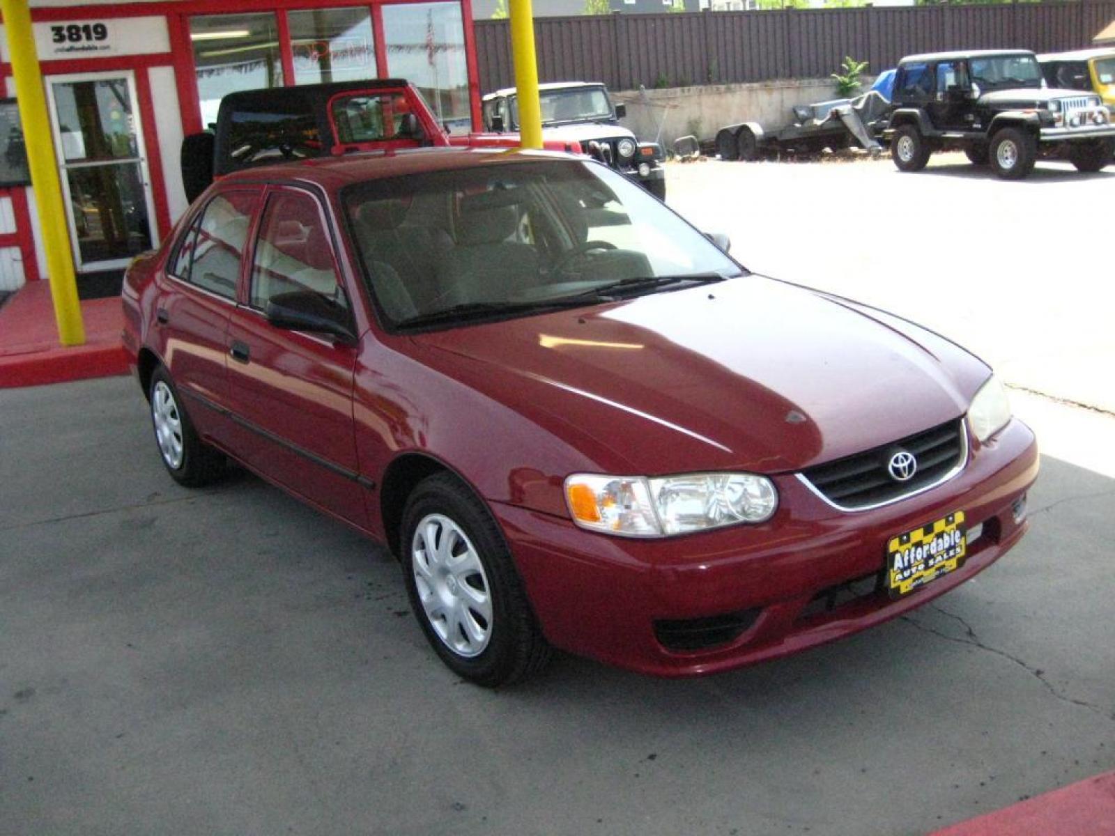 2001 Maroon /tan Toyota Corolla CE (1NXBR12E81Z) with an 1.8L L4 DOHC 16V engine, auto transmission, located at 3819 South Hwy 89, Bountiful, UT, 84010, (801) 298-3777, 40.876678, -111.870071 - SOLD To check out similar vehicles and our entire inventory go to www.utahaffordable.com. - Photo #4