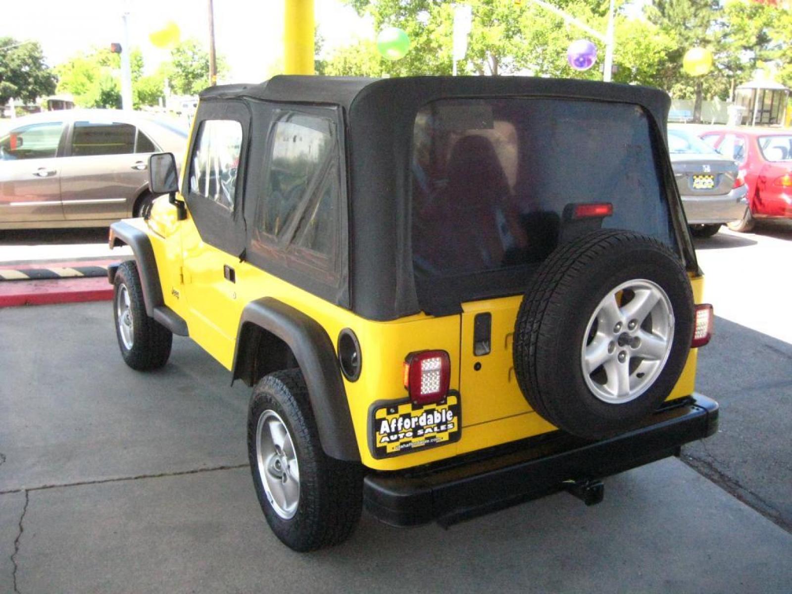 2001 Yellow /Black Jeep Wrangler SE (1J4FA29P41P) with an 2.5L L4 OHV 8V engine, automatic transmission, located at 3819 South Hwy 89, Bountiful, UT, 84010, (801) 298-3777, 40.876678, -111.870071 - SOLD To check out similar vehicles and our entire inventory go to www.utahaffordable.com. - Photo #1